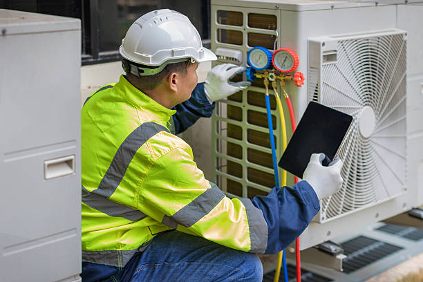 Professional Emergency Hvac Repair technician working in Bloomfield, NY